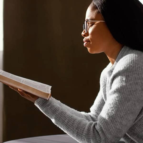 Woman reading her bible