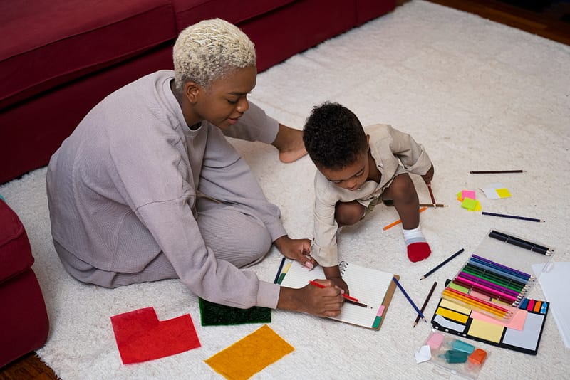 A mother and baby playing for the post: April is Autism Awareness Month